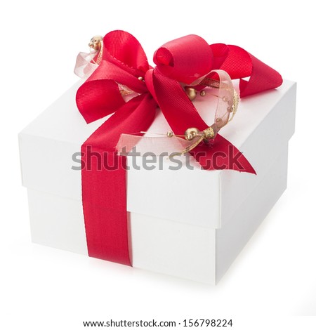 Close up of a plain white gift box with two decorative red and gold bows for celebrating Christmas, Valentines, birthday or an anniversary over a white background