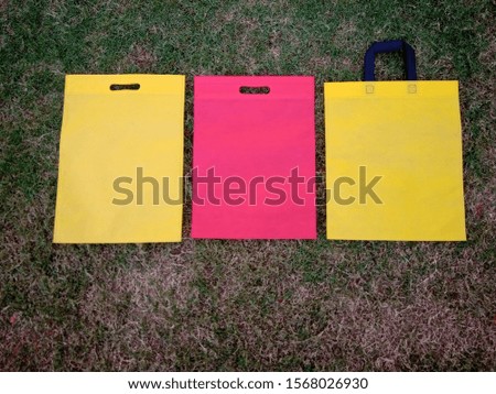 amazing Multicolored ECO Friendly Bags, Non Woven Bags on Green Grass