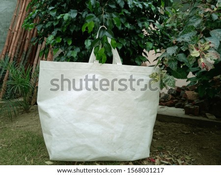 Eco Friendly white Bag, Non Woven Bag on green
