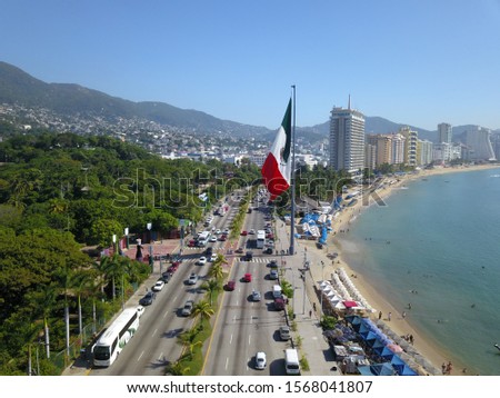 A picture of Acapulco Bay with the Mexican flag  (South View)