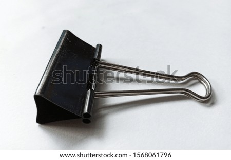 Tool for making black chrome book clips.