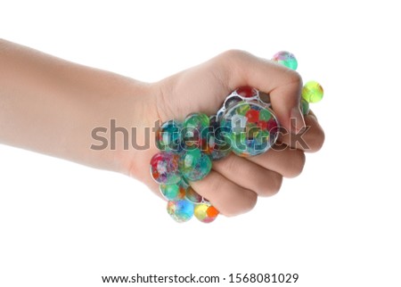 Woman squeezing colorful slime isolated on white, closeup. Antistress toy
