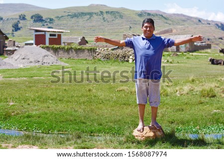 Excited native american man in the countryside. Feeling of freedom.