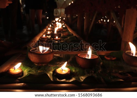 Candle Lighting in Loy Krathong festival , Yee Peng Festival (North of Thailand new years) , Chiangmai ,Thailand. 