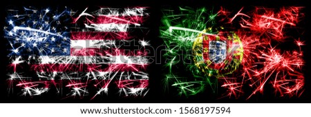 United States of America, USA vs Portugal, Portuguese New Year celebration sparkling fireworks flags concept background. Combination of two abstract states flags.
