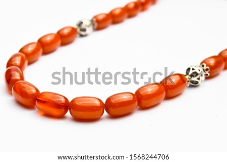 Brown and silver beads sequenced, short rosary, tespih tesbih, an important accessory for Turkish culture, isolated on white background.