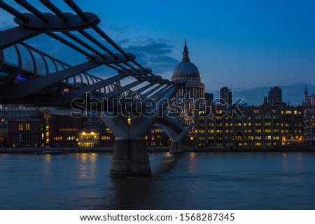 St Pauls Cathedral seen over the river Thames.