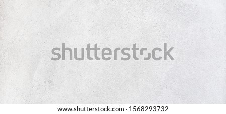 White background of cement or concrete wall texture in grayscale. Royalty-Free Stock Photo #1568293732