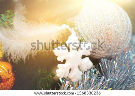 2020. Merry Christmas and New Year holidays  concept lovely decorated  glitter ball close up toys on the background .selective focus