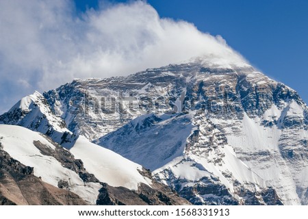 Photo Mountain Everest (Mount Qomolangma). Taken in the base China camp of north side Everest in the Tibet region. Over here, altitude is 5200m. Strong wind on top of the summit.