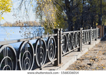 Iron fence on the waterfront