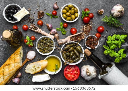Fresh ingredients of italian food, mediterranean diet, background Royalty-Free Stock Photo #1568363572