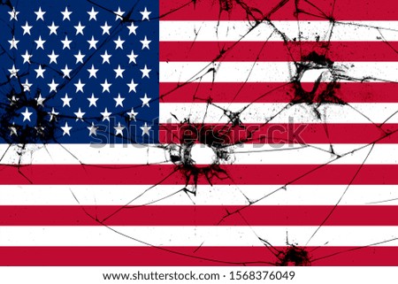 national flag of the united states of america. Cracks, bullet holes