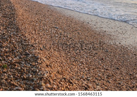 seashore natural ocean landscape pebbles and water