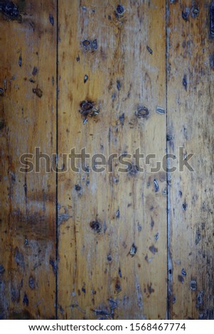 Textured wooden background. Antique boards with nails. Clouse up photo of door.
