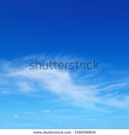 Light clouds in the blue sky.