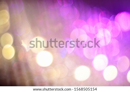 Colorfull and abstract bokeh of light for a dark background