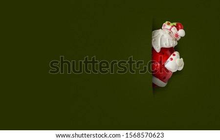 Happy Santa Claus on green background.Merry christmas and  happy new year concept background with copy space. 