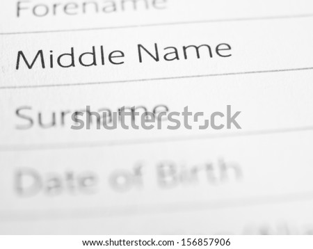 MIDDLE NAME on a printed form close up