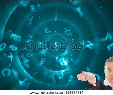 Composite image of blonde businesswoman pointing somewhere on blue background with swiveling letters