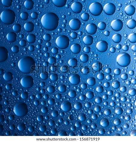 Waterdrops on blue background