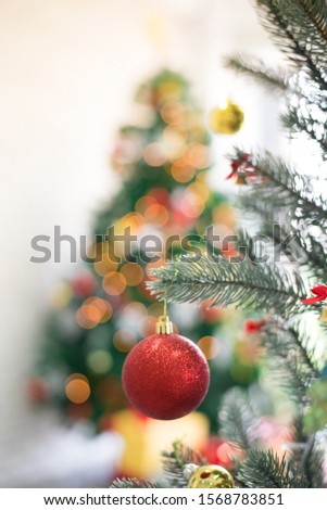 Christmas tree decoration picture With a red ball Golden, bokeh light background