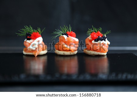 Smoked salmon canapes Royalty-Free Stock Photo #156880718