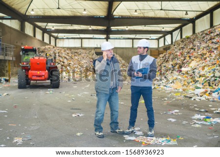 workers of recycling industrial plant
