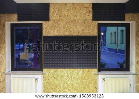 Audio recording and reharsal room with sound proofing panels
