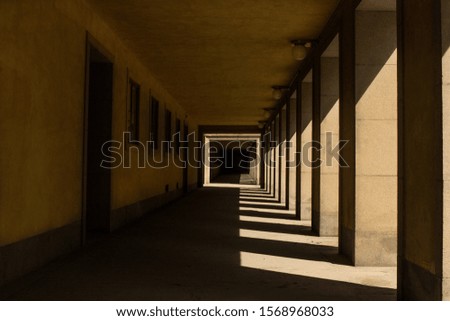 reflection of the shadows towards the corridor in a sunny day