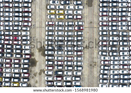 View from above, stunning aerial view of a parking lot full of brand new cars ready to be exported and sold. Singapore. Singapore is an island city-state off southern Malaysia.