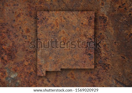 Detailed and colorful image of map of New Mexico on rusty metal
