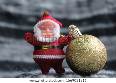 Santa Claus figurine with a little gift