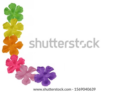 fake flower pink,yellow,orange,green,red,purple made from fabric isolate on background