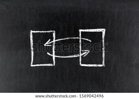 Exchange, swap concept on chalkboard, blackboard background Royalty-Free Stock Photo #1569042496