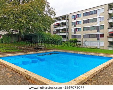 Small pool and playground in a residential area - Zürich (Zurich or Zuerich), Switzerland