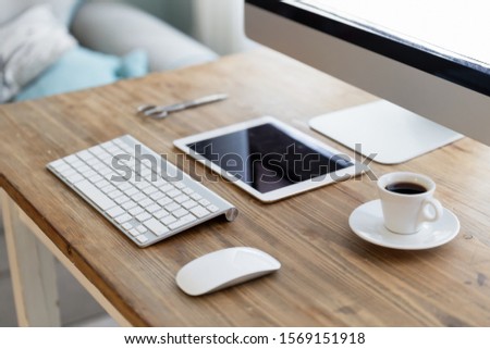 Picture of modern office desk with devices