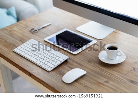 Picture of modern office desk with devices