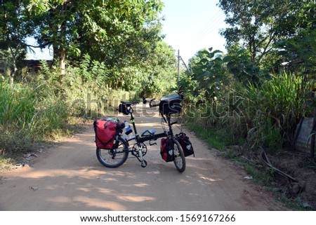 Folding bicycle on a secondary road,Sri Lanka