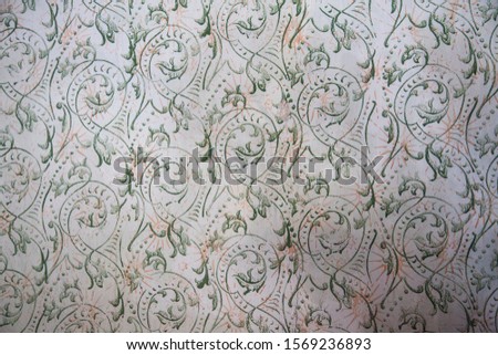 antique wallpaper on the wall as decoration