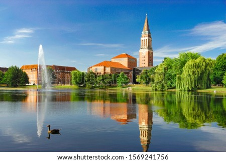 City of Kiel - Kleiner Kiel with Town Hall Tower, Opera House and Hiroshima Park Royalty-Free Stock Photo #1569241756