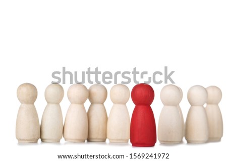 Leader concept. Wooden figures on white background