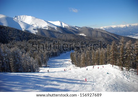 Panorama of winter mountains. Alpine ski resort Bansko, Bulgaria Royalty-Free Stock Photo #156927689