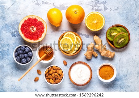 Healthy products for Immunity boosting and cold remedies, top view. Royalty-Free Stock Photo #1569296242