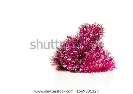 Christmas or New Year purple tinsel pyramid isolated on white background
