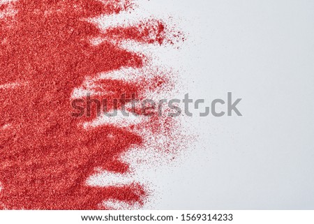 Abstract texture. Red glitter background