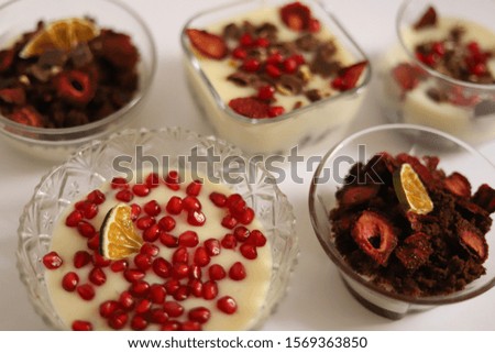 Custard bowls decorated with different fruits