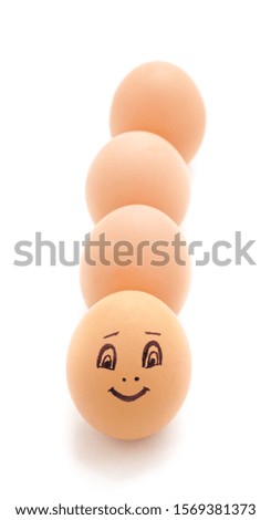Egg with face isolated on a white background.