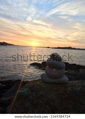 Rock ornament / placement with sunset behind 