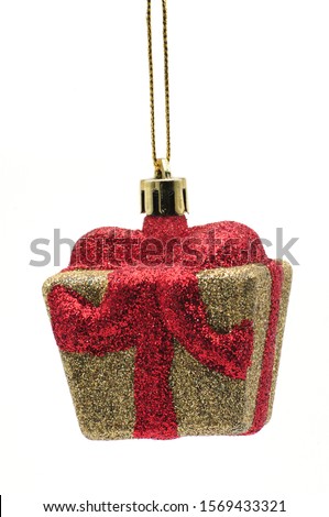 Golden Gift Box Christmas and New Year toy on a isolated white background